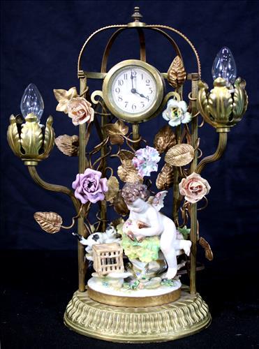 Brass and porcelain electric clock lamp with cupid (1 of 5)