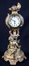 Small French figural bronze clock, 9.5 in. T.