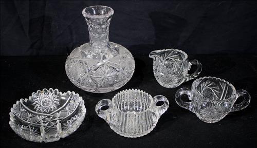5 pieces, cut crystal tray, 2 sugar , 1 creamer, carafe: 5 pieces, cut crystal tray, 2 sugar, 1 creamer and carafe, 7.5 in. T, 7 in. R.