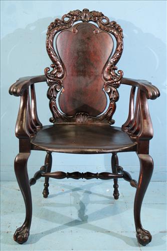 Mahogany carved Stickley Brandt arm chair: Mahogany Stickley Brandt carved arm chair, 41 in. T, 26 in. W, 19 in. D.