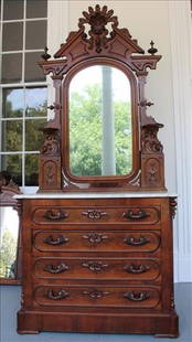 Walnut Victorian marble top dresser with white original marble: Walnut Victorian marble top dresser with white original marble, hand carved pulls and top crown, 97 in. T, 48 in. W, 20 in. D.