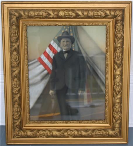 Early old Victorian colorized photo of man in gold frame: Early old Victorian colorized photo of man standing in front of an American flag in antique gold ornate frame, 30 x 26