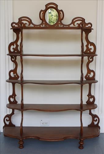 Walnut Victorian 5 tier etagere with mirrored crown: Walnut Victorian 5 tier etagere with mirrored crown, 66 in. T, 43 in. W, 15 in. D.