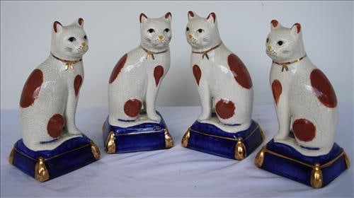 4 piece set of Staffordshire style cats sitting on pillows (1 of 3)