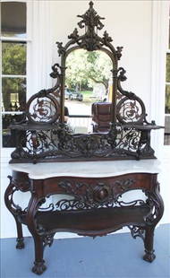 Rosewood rococo laminated M/T etagere by Daniel Pabst: Rosewood rococo laminated marble top etagere with original white marble, beautifully carved attrib. to Daniel Pabst