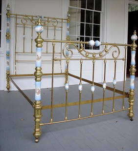 Full size brass and iron bed with porcelain plaques: Full size brass and iron bed with porcelain plaques, 42 in. T, 74 in. L, 55 in. W.