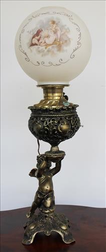 Brass Victorian lamp with cherub figure holding lamp (1 of 3)