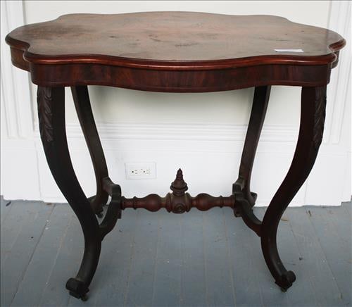 Mahogany Victorian turtle top center table on rollers (1 of 3)