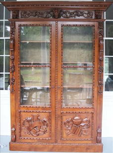 Fantastic walnut Victorian 2 door wardrobe: Fantastic walnut Victorian 2 door wardrobe with lion heads instruments, fruit and acorn accents, 94 in. T, 62 in. W, 14 in. D.