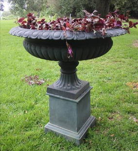 Extremely large heavy cast iron urns, 2 piece black: Extremely large heavy cast iron urns, 2 piece black, 48 in. T, 40 in. W.