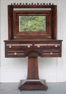 Mahogany empire dressing table with pedestal base: Mahogany empire dressing table with pedestal base and glass pulls, 60 in. T, 36 in. W, 17 in. D.