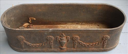 Heavy cast iron planter with decorative draped sides (1 of 3)