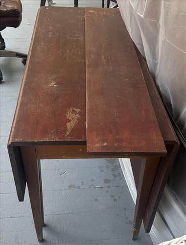 Early drop leaf table with 1 extra 12 in. leaf: Early drop leaf table with pointed legs and 1 extra 12 in. leaf, 29 in. T, 50 I n. W, 22 in. D.