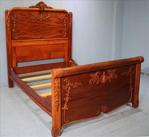 Mahogany high back bed with roll foot board, with mattress: Mahogany high back bed with roll foot board and lots of carving, 69 in. T, 56 in. W, 77 in. L. with mattress