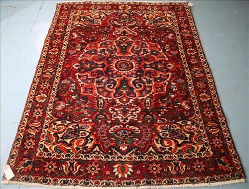 Iranian hand knotted Persian rug, 4 ft. 11 in. x 6 ft. 7 in.: Iranian hand knotted Persian rug, with center medallion from Magnolia Hill, 4 ft. 11 in. x 6 ft. 7 in.
