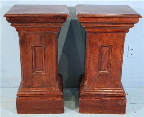 Pair of mahogany pedestals with door on backside: Pair of mahogany pedestals with door on backside, 35 in. T, 19 in. Sq.