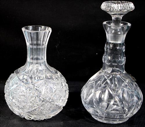 Pair of brilliant cut glass wine carafes, 11.5 in. T, 6.5 in. W.: Pair of brilliant cut glass wine carafes, one has missing stopper, 11.5 in. T, 6.5 in. W.