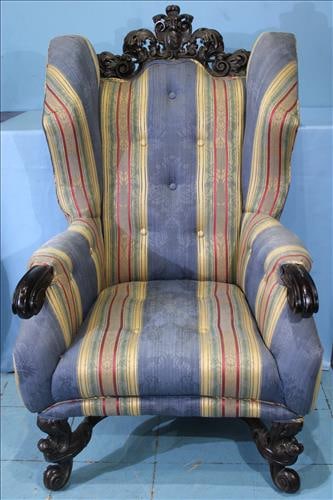 Extremely heavy and large carved fireside chair (1 of 5)