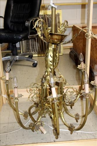Brass gasolier converted to electric with leaves on arms, 36 x 28: Brass gasolier converted to electric with leaves on each arm, matches lot # 123, needs some restoration, 36 in. T, 28 in. W.