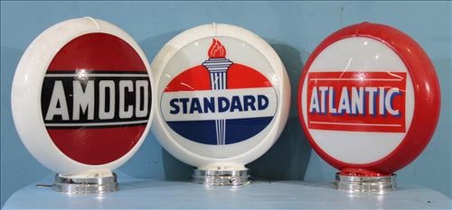 3 piece set of replacement round gas pump medallions: 3 piece set of replacement round gas pump medallions, 18 in. T, 16 in. Dia.: Standard Oil Co, Amoco - red, black and white logo and Atlantic - red, white and blue logo