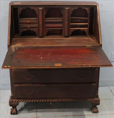 Mahogany 4 drawer slant front desk with ball and claw feet: Mahogany 4 drawer slant front desk with original pulls, gadrooned bottom edge and ball and claw feet, 42.5 in. T, 36 in. W, 19 in. D.