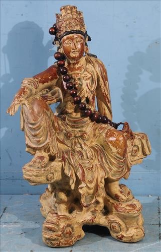 Carved wooden Asian religious icon with beads: Carved wooden Asian religious icon with beads, 31 in. T, 21 in. W.