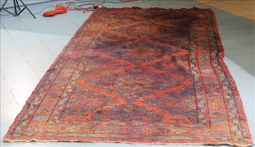 Handmade Persian rug in blue, red, tan with water damage: Handmade Persian rug in blue, red, tan with wear and water damage, 12.3 x 6 ft.