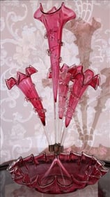 Cranberry 4 trumpet antique epergne, 20 in. T, 12 in. W.