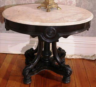 Walnut Victorian oval center table attributed to Thomas Brooks