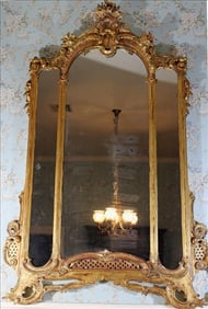 Beautiful gold gilded mirror with ornate crown, original furnishing to Anne Rice home in New
