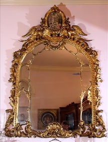 Fabolous ornate gold leaf wall mirror with swans, has painting on porcelain in top crown, true