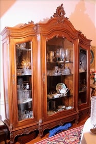 Walnut 3 door French display cabinet with glass shelves and ornate crown, 8 ft. 11 in. T, 86 in. W,