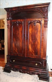 Flame mahogany linen press, 2 door, 1 with brass pulls, 7 ft. 11 in. T, 60 in. W, 21 in. D.