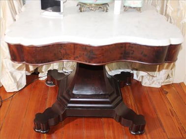 Mahogany Empire center table with large pedestal, claw feet, original finish and thick marble,