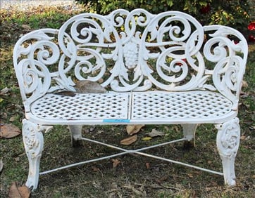Small heavy cast iron love seat garden furniture with grapes in back