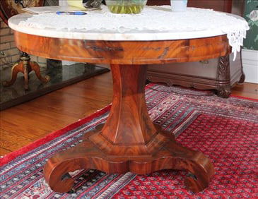 Mahogany center table with scroll feet, 30 in. T, 36 in R.