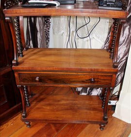 Walnut etagere with pierced carved gallery