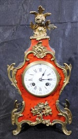 French clock with bronze trim, pendulum and key