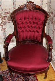 Rosewood Victorian parlor arm chair with red upholstery