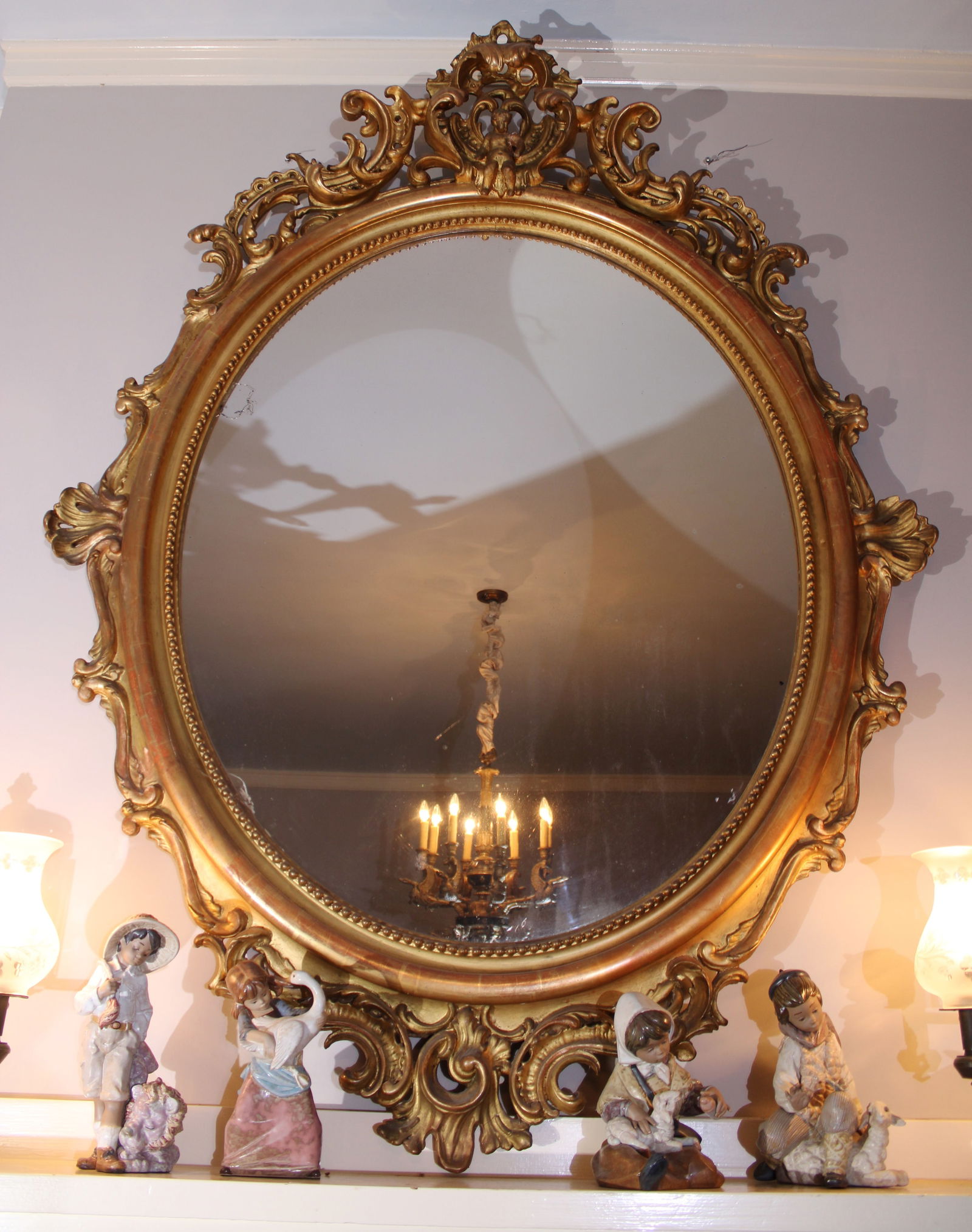 Beautiful victorin gold gilded mantle mirror with little boy in crown (1 of 3)