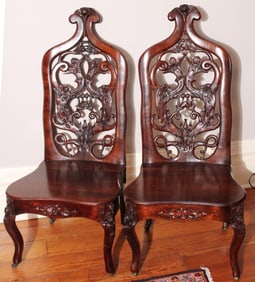 Pair of rosewood Belter slipper chairs with serpentine shape back