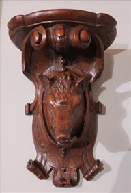 Pair of solid walnut wall shelves, one is a hog, other is a fox