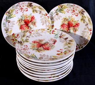 11 heavy porcelain Christmas plates with Santa on plates, 11 in. R.