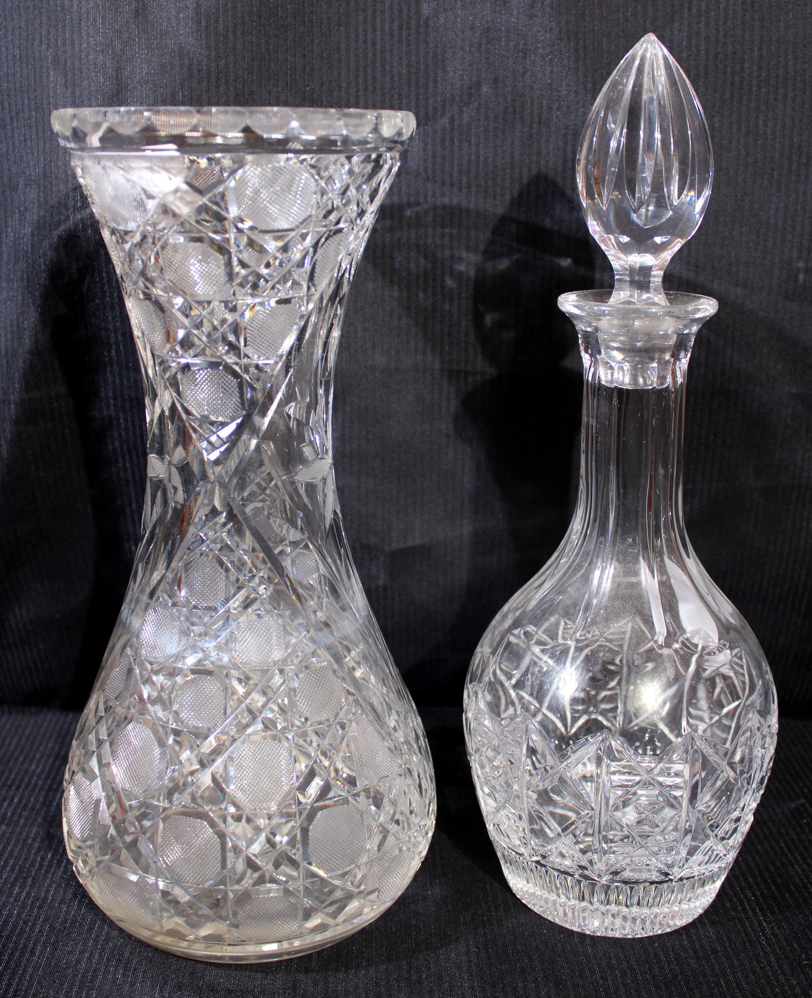 2 pieces, wheel cut glass vase and wine decanter with good stopper: 2 pieces, wheel cut glass vase - 12 in. T. and wine decanter with good stopper - 13 in. T.