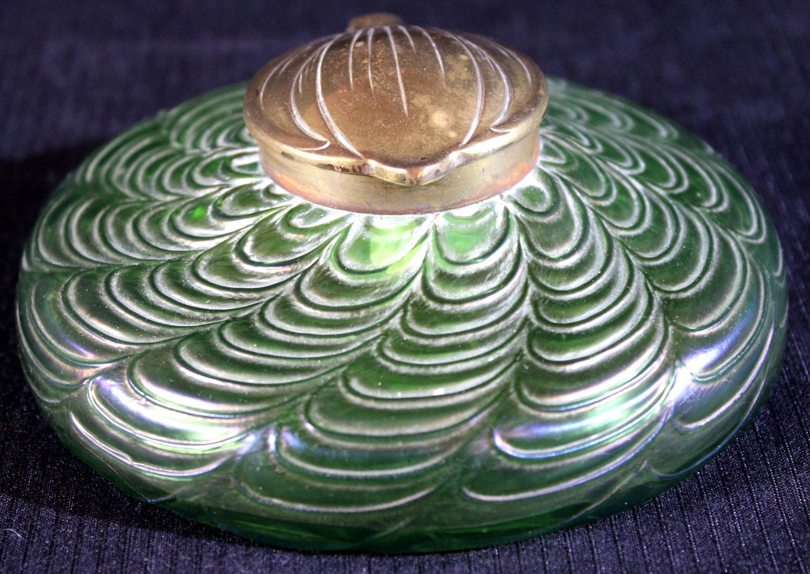 Green art glass ink well with brass lid, 6 in. dia. Chip on ink container: Green art glass ink well with brass lid, 6 in. dia. Chip on ink container