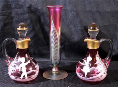 3 pieces, pair of Mary Gregory cruets, 6 in. T. and art glass base, 8 T.