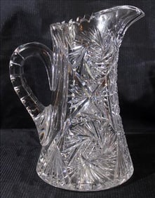 Very heavy pin wheel cut pitcher in good condition, 11 in. T, 6 in. W.