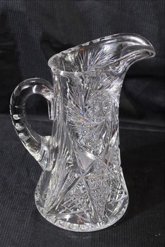Heavy cut glass pitcher with applied handle, 11 in. T, 6 in. W. (1 of 2)