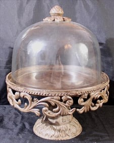Metal cake stand with glass dome cover, 15 in. T, 13 in. R.