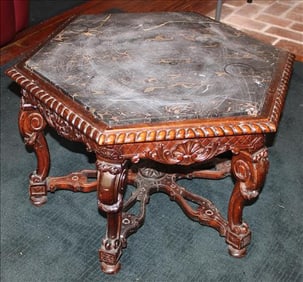 Mahogany octagon shape coffee table with black and gold marble